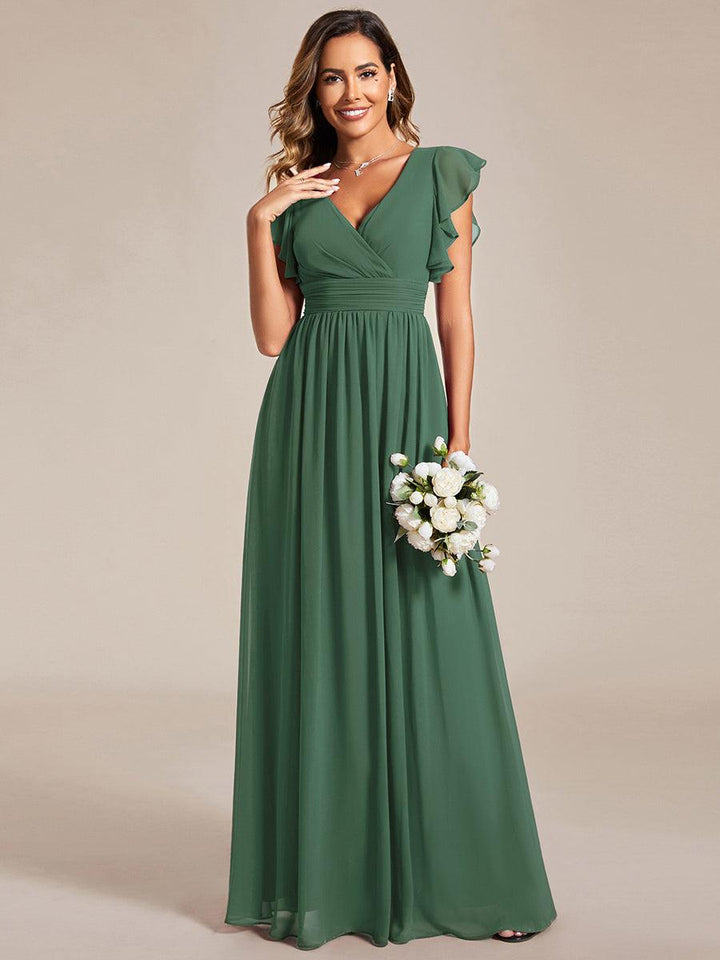 Robe élégante, dos ouvert, col en V, fluide. Idéale pour demoiselle d'honneur, soirée ou mariage.