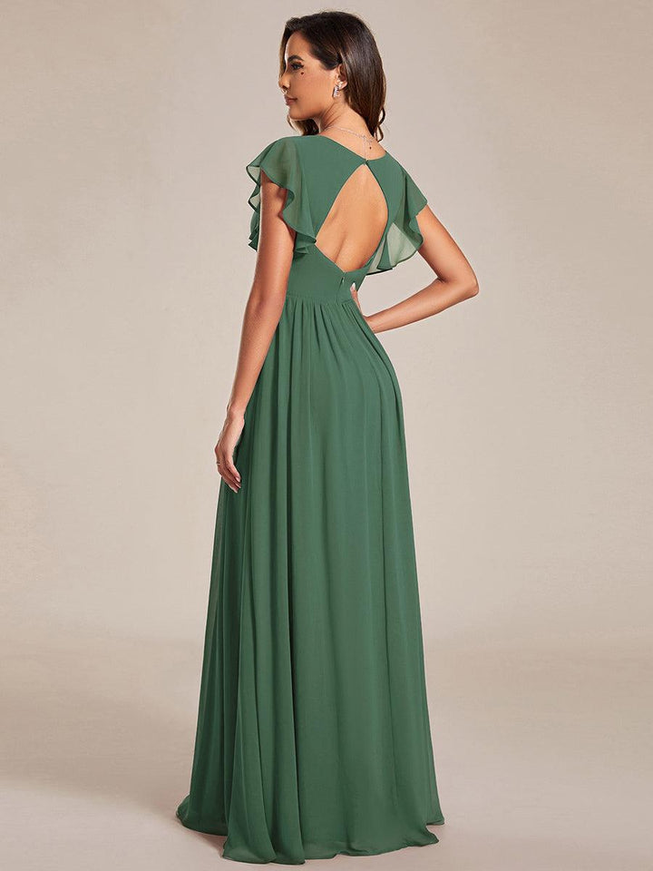 Robe de fête femme, dos ouvert, manches courtes. Fluide et maxi pour un look estival chic.