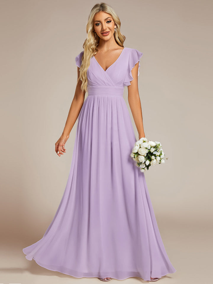 Robe élégante, dos ouvert, col en V, fluide. Idéale pour demoiselle d'honneur, soirée ou mariage distingué.