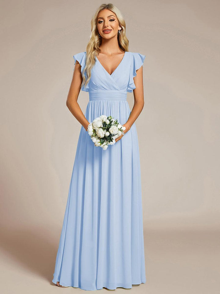 Robe longue élégante, dos ouvert, fluide. Idéale pour demoiselle d'honneur et les grandes fêtes.