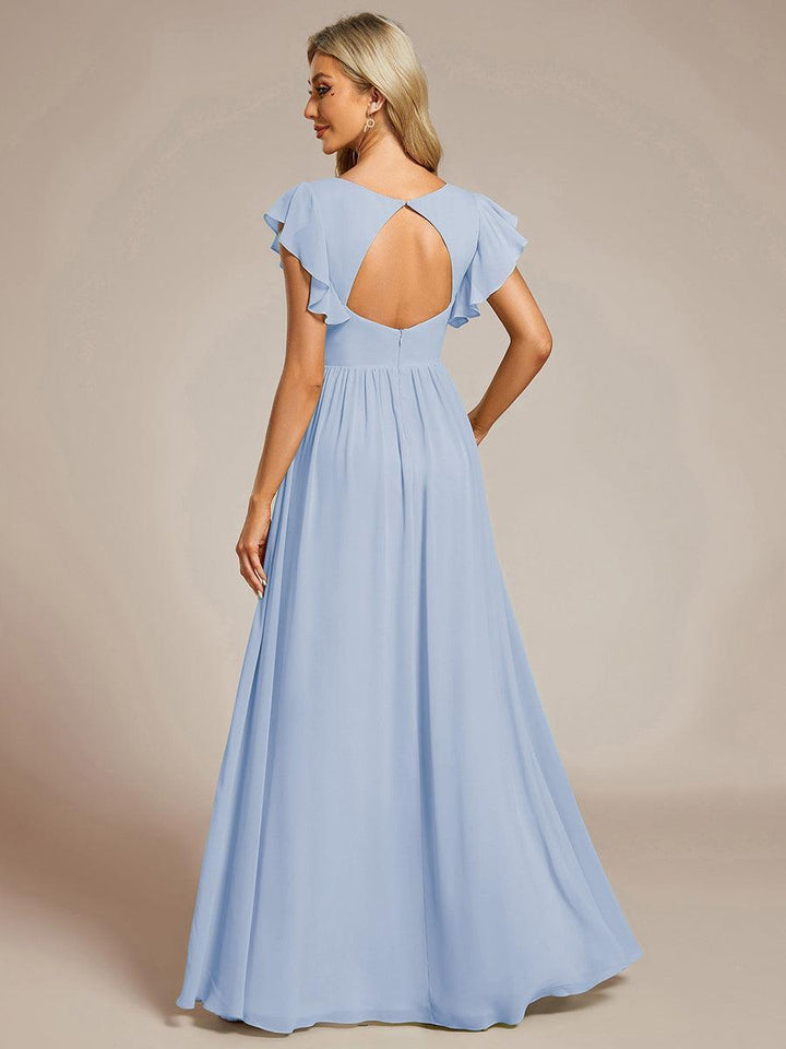Robe de fête, dos ouvert, col en V, manches courtes. Fluide et maxi pour femme élégante.