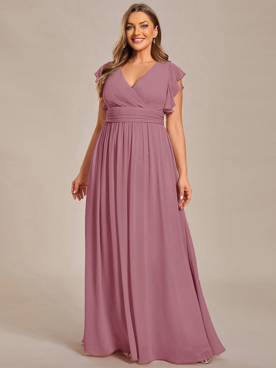 Robe de fête femme, dos ouvert, manches courtes. Fluide et maxi pour un look estival élégant et stylé.