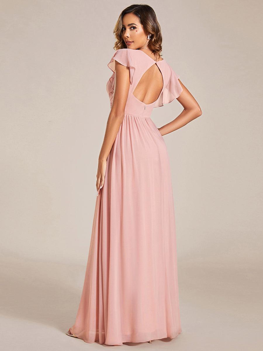 Robe longue femme, dos ouvert, col en V. Élégante pour une cérémonie ou soirée de printemps chic et raffinée.