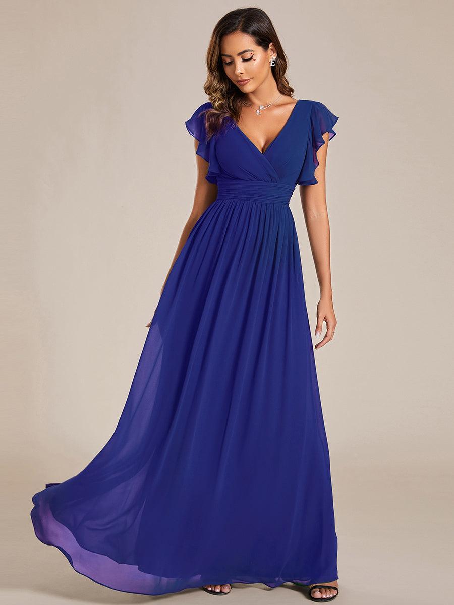 Robe de demoiselle d'honneur élégante, dos ouvert, fluide. Parfaite pour cérémonie ou mariage.