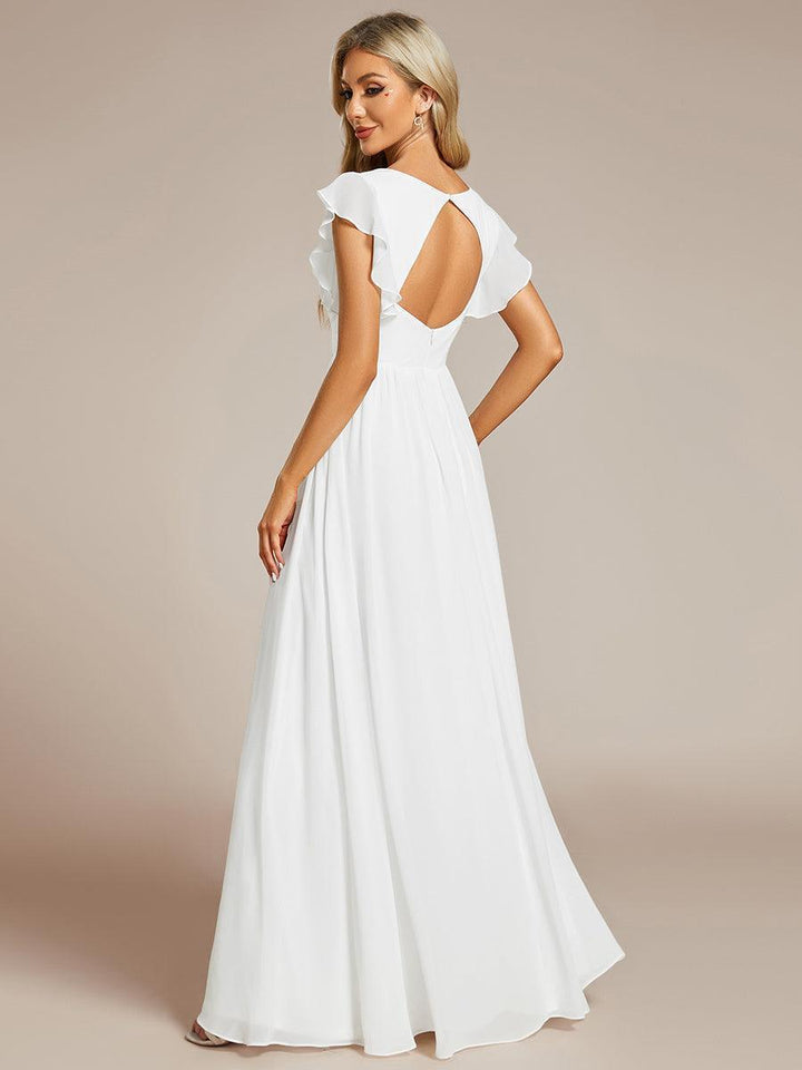 Robe de femme, dos ouvert, col en V, longueur maxi. Parfaite pour un mariage élégant en été.
