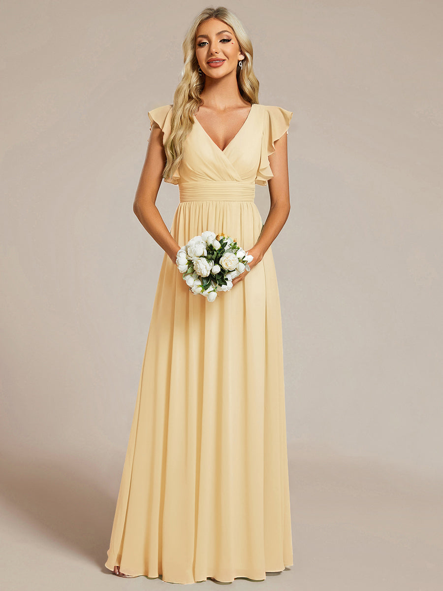 Robe longue femme, dos ouvert, manches courtes. Élégante pour une soirée ou un mariage d'été plein de charme.