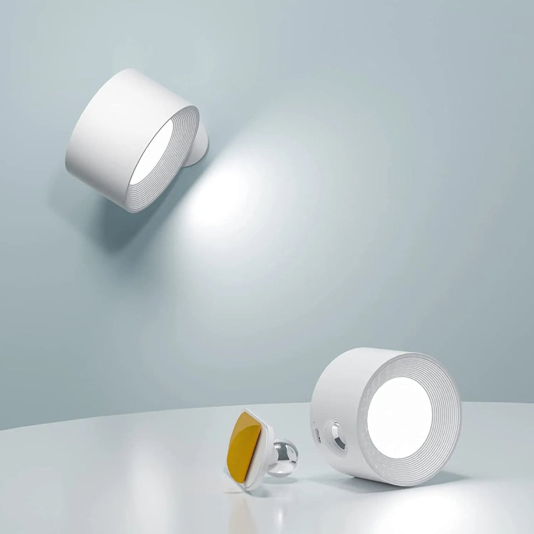 Lampe murale LED magnétique sans fil rechargeable, design moderne pour éclairage intérieur polyvalent.