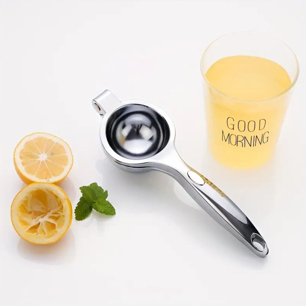 Ustensile de cuisine ergonomique: presse-agrumes manuel durable en acier inoxydable pour un jus de citron rapide.
