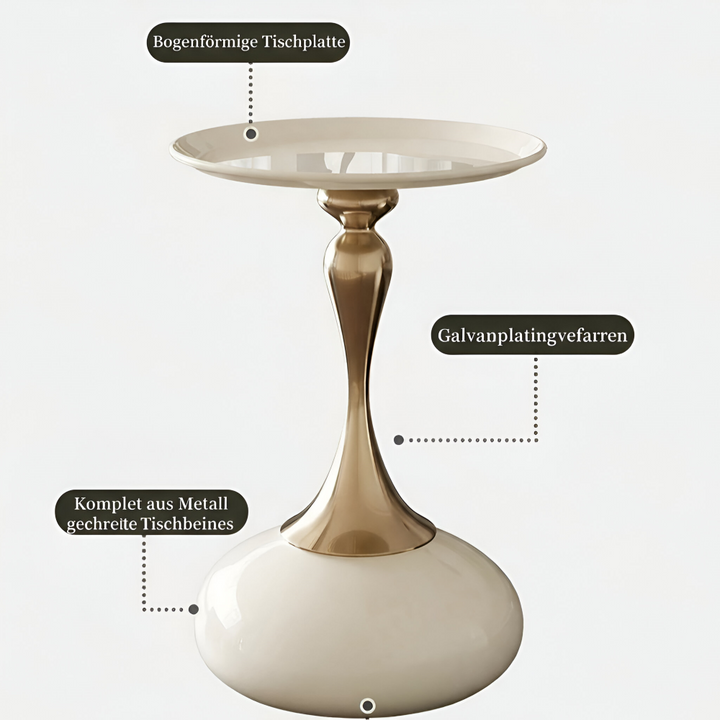 Table d'appoint minimaliste ronde dorée, structure métal élégante, parfaite pour un décor épuré.