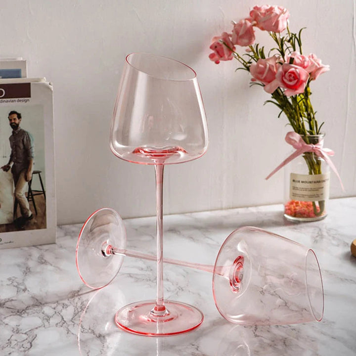 Paire de verres à vin en cristal rose soufflé bouche, sublimes pour champagne, vins et cocktails.