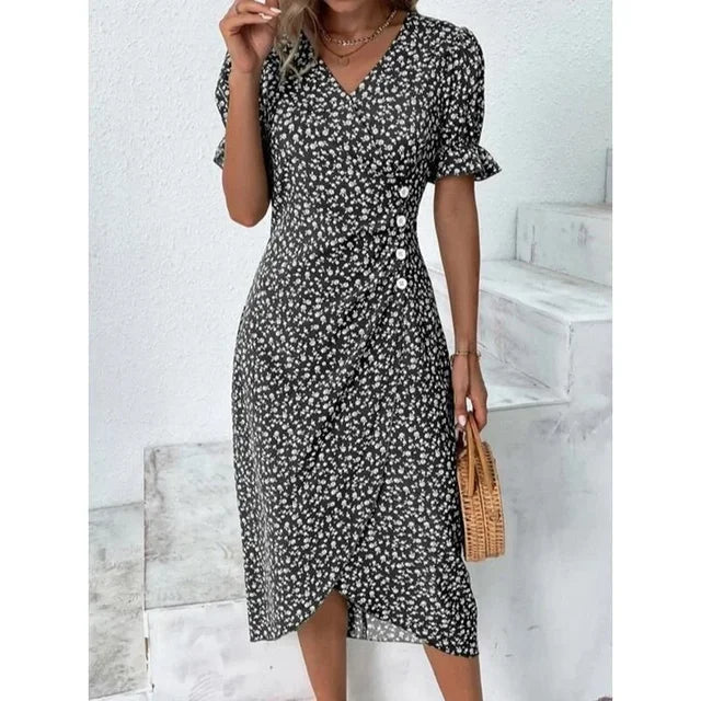 Robe florale élégante pour femme, coupe midi fluide, idéale pour l'été et le printemps.