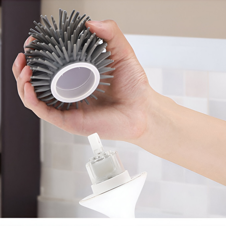 Brosse de toilette électrique UV PureSpin au design moderne avec support mural, pour une salle de bain propre et désinfectée.