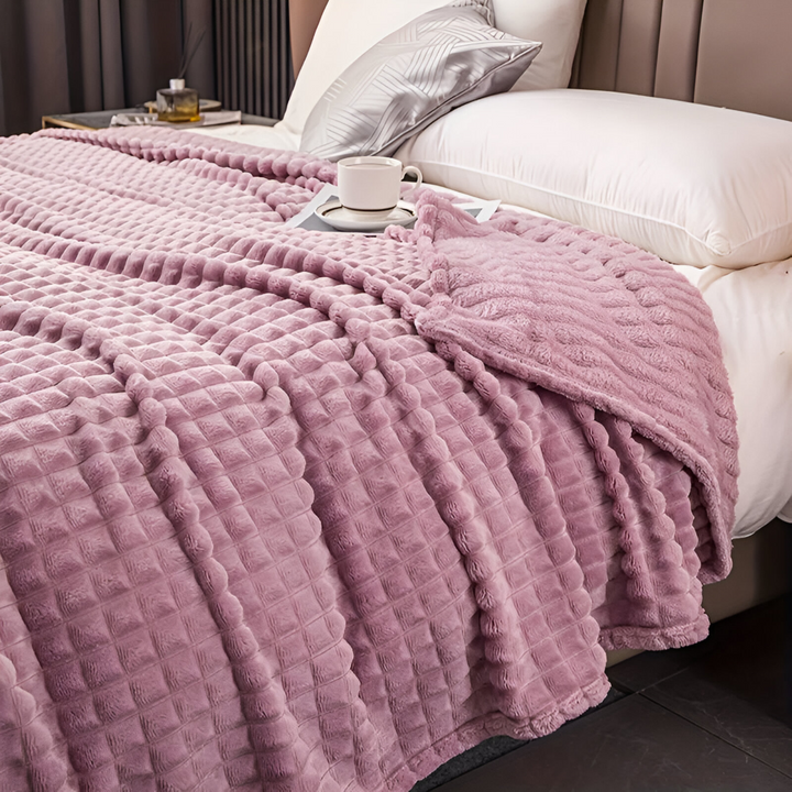Couverture plaid à carreaux, réversible et chaude, pour un confort élégant dans toute la maison.