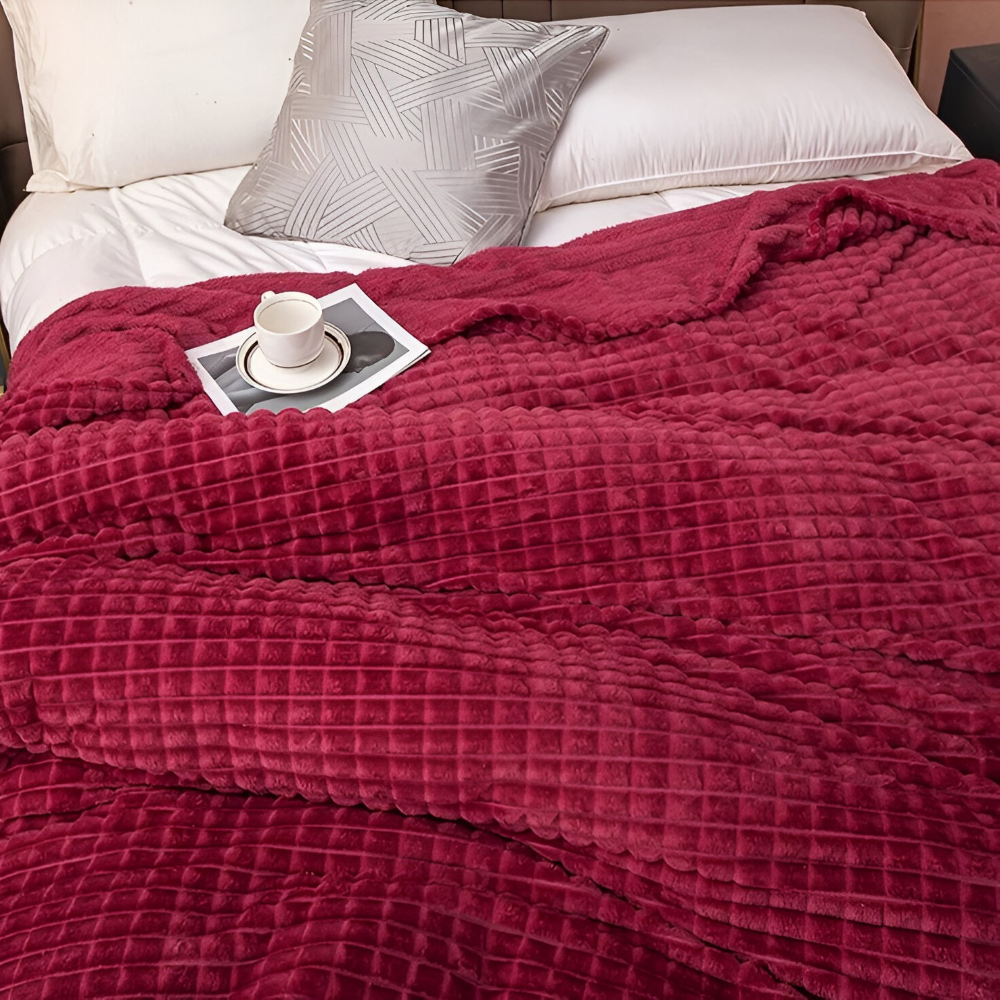 Plaid doux à carreaux géométriques, chaud et élégant, parfait pour le confort de la maison.