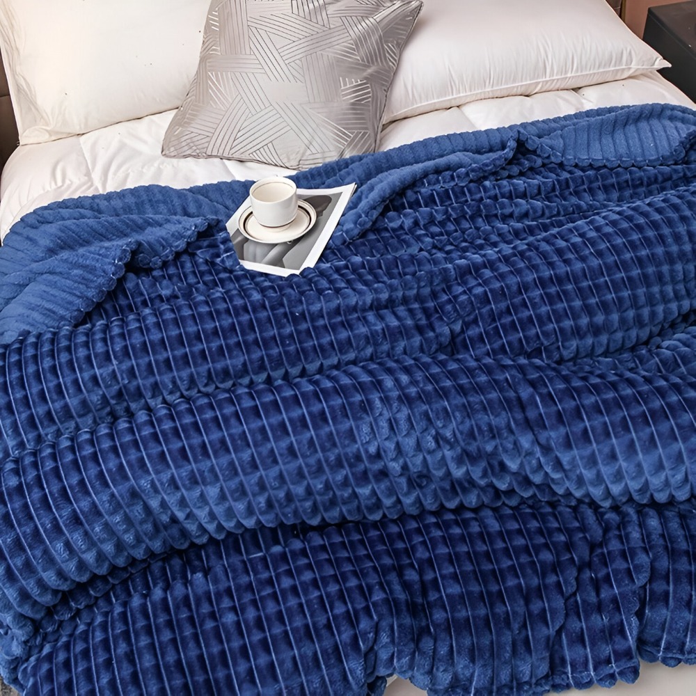 Couverture chaude et douce à carreaux, un plaid confortable pour vos moments de détente.