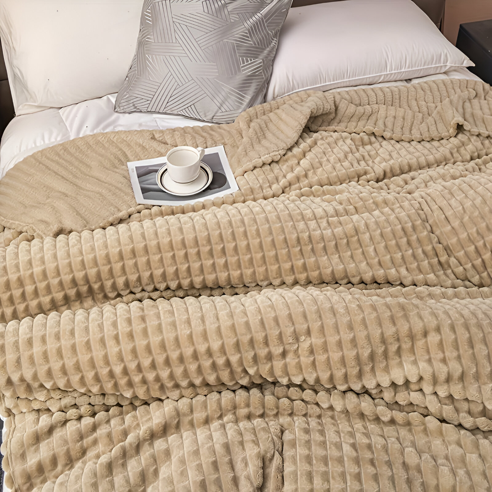 Jeté de lit plaid à carreaux, confortable et chaud, ajoutant une touche décorative.