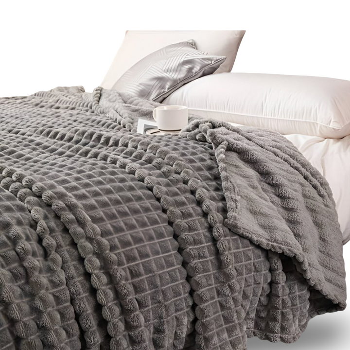 Plaid ultra doux à carreaux, chaud et confortable, parfait pour les moments de détente.