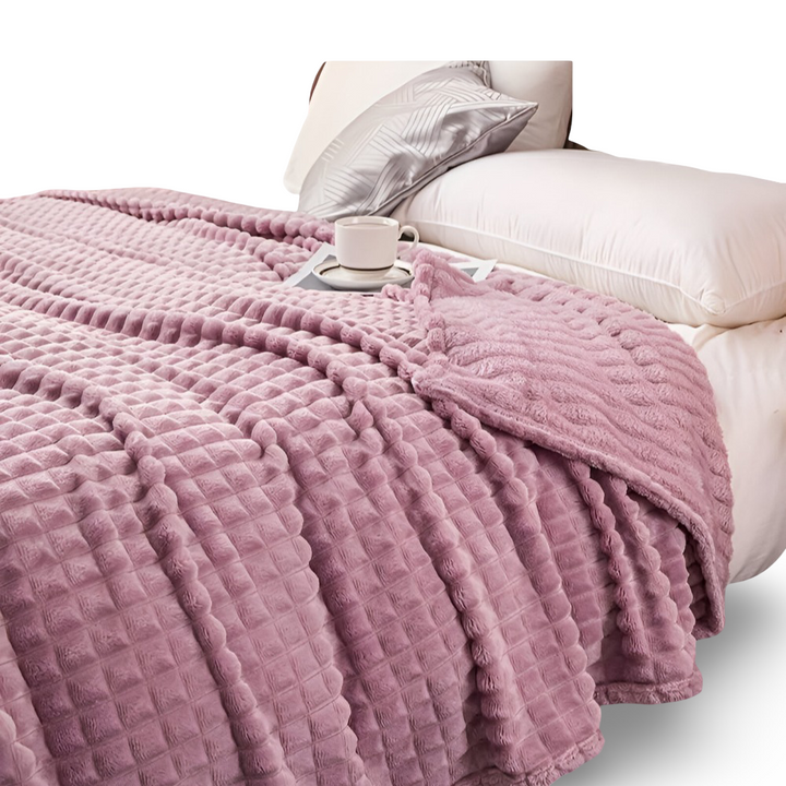 Plaid polaire à carreaux, chaud et réversible, un choix élégant pour le confort de la maison.