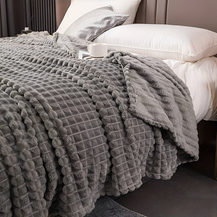 Jeté de lit décoratif à carreaux, plaid polaire chaud et élégant pour la chambre.