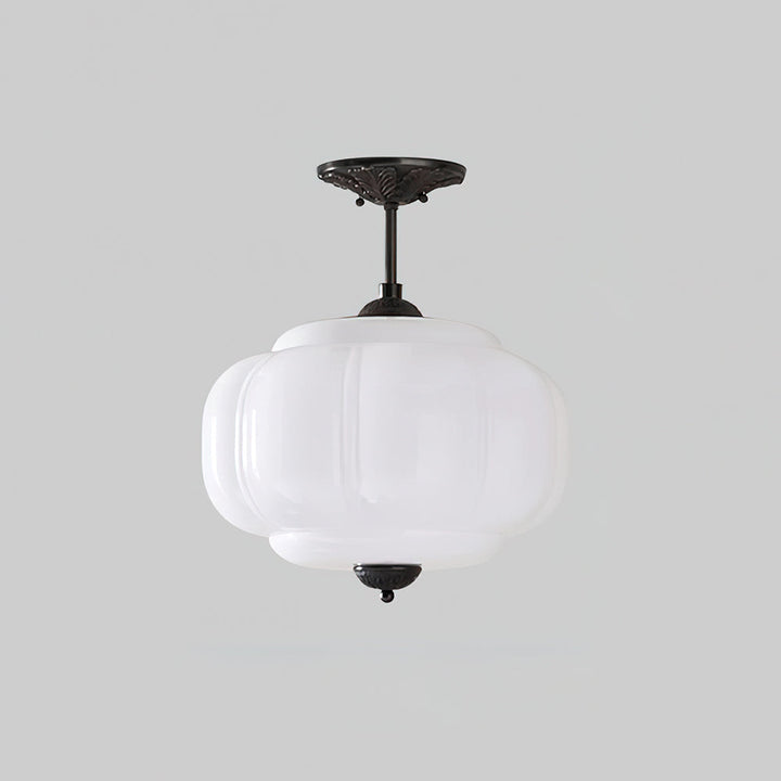 Élégante lampe de plafond en verre semi-encastrée, forme arrondie, pour tout intérieur moderne.