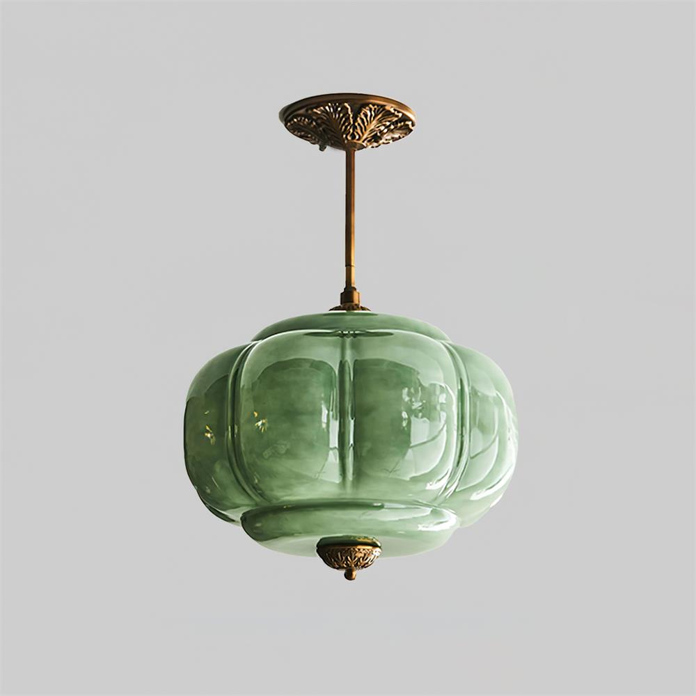 Plafonnier en verre translucide, design arrondi, éclairage diffus pour un confort visuel.