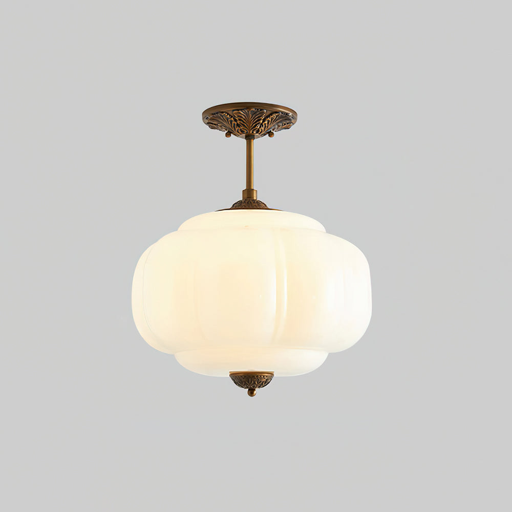 Plafonnier moderne en verre à forme arrondie pour un éclairage semi-encastré et raffiné.