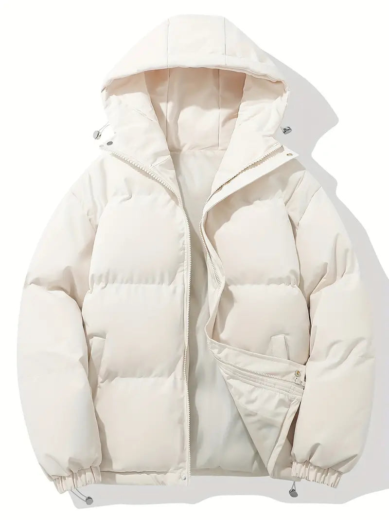 Veste matelassée Clara pour femme avec capuche, idéale pour l'automne/hiver, chaude et élégante.
