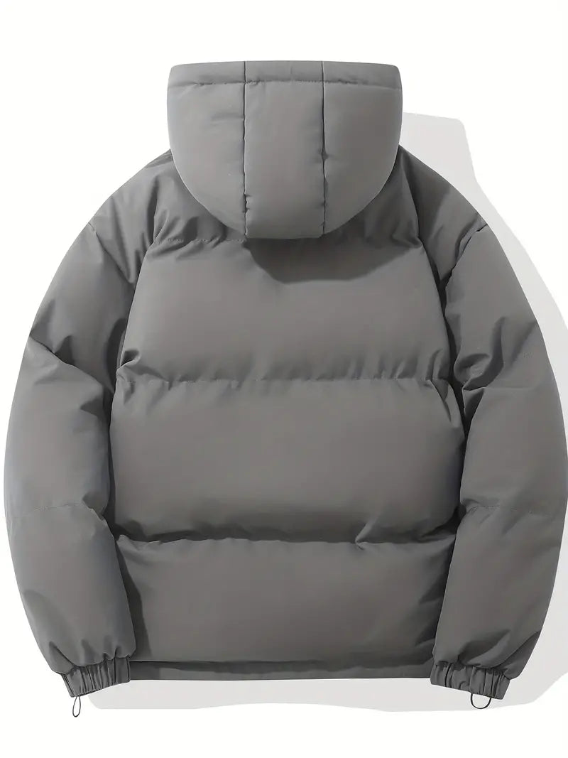 Détail de la veste matelassée Clara femme, avec surpiqûres et capuche douillette.