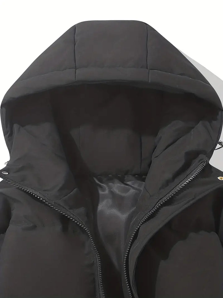 Veste matelassée Clara à capuche, un incontournable mode femme pour la saison fraîche.