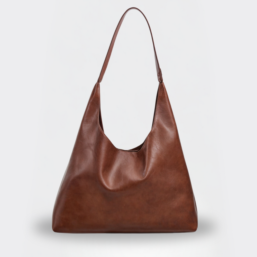 Sac fourre-tout élégant marron en cuir végétal pour femmes. Grand sac quotidien, parfait pour le shopping et les tendances.