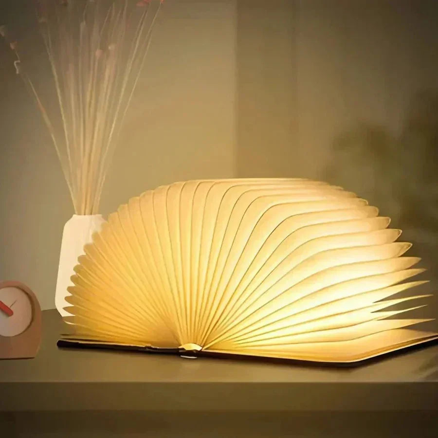 Lampe de livre pliable StoryGlow, lumière LED chaude ajustable, rechargeable via USB, design bois.