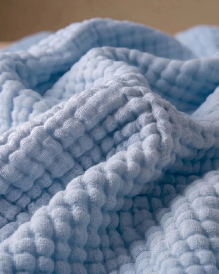 Jeté de lit en coton, élégant, respirant et doux, pour un confort accru dans votre chambre.