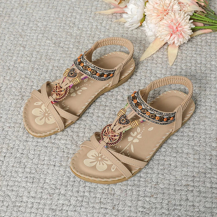 Sandales confortables femme à strass, idéales pour les vacances d'été. Chaussures plates bohèmes, élégantes et ouvertes.