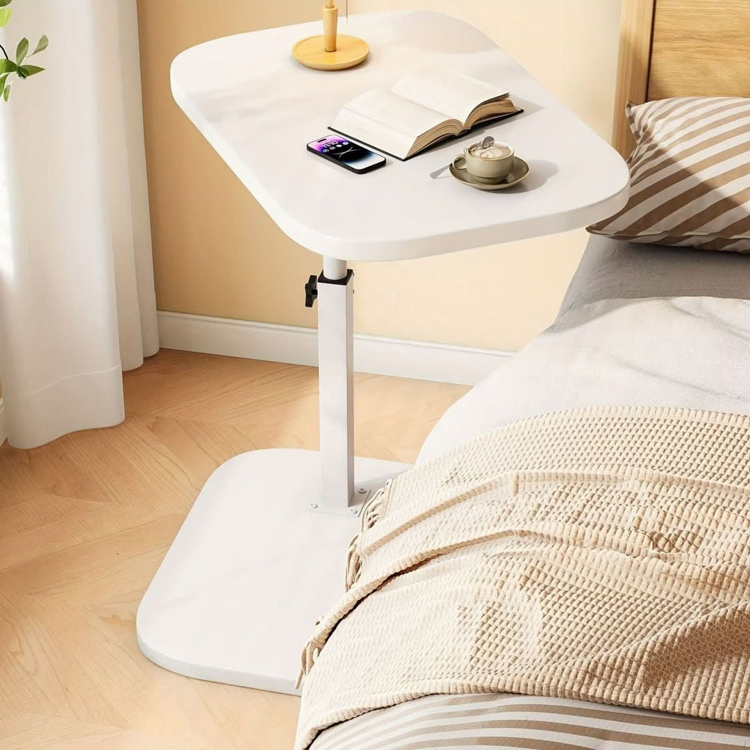 Table d'appoint ajustable, offrant flexibilité et style pour votre salon ou chambre moderne.