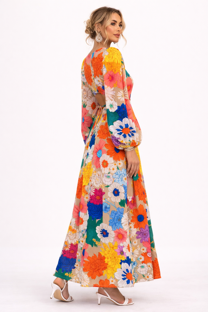 Robe d'été longue florale femme avec manches bouffantes, imprimé vibrant. Parfaite pour une tenue chic et décontractée.