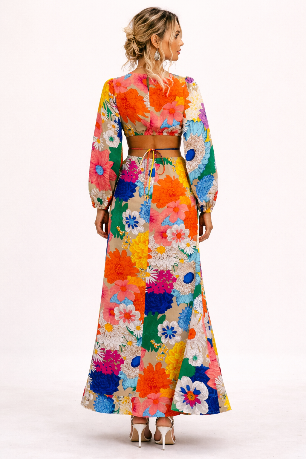 Robe maxi florale femme élégante, manches bouffantes. Style bohème fluide, idéale pour l'été et les occasions spéciales.