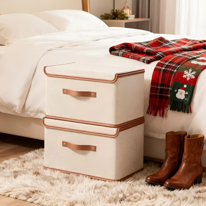 Organiseur maison : boîte de rangement pliable en tissu avec poignées cuir pour un stockage astucieux.