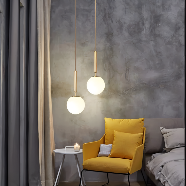Lampe moderne pour salle à manger, design nordique, ambiance lumineuse douce.