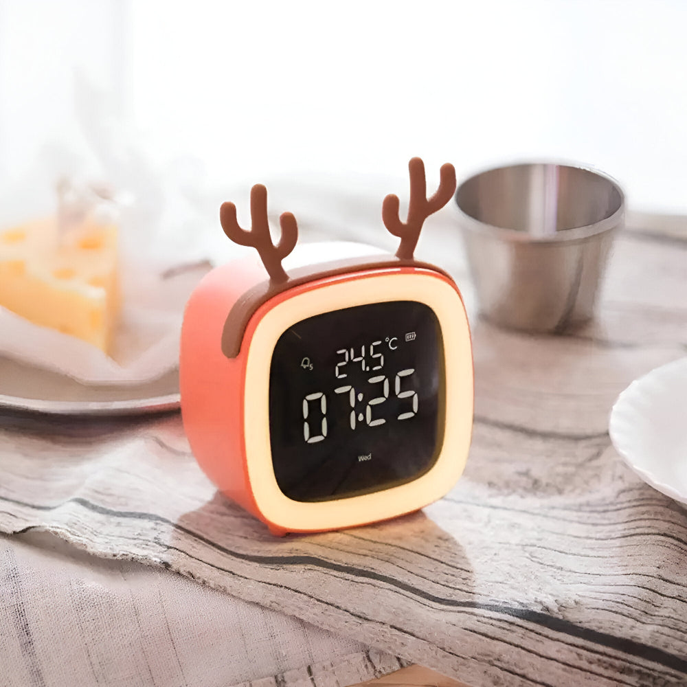 Réveil enfant programmable avec fonction veilleuse LED, parfait pour le sommeil des petits.