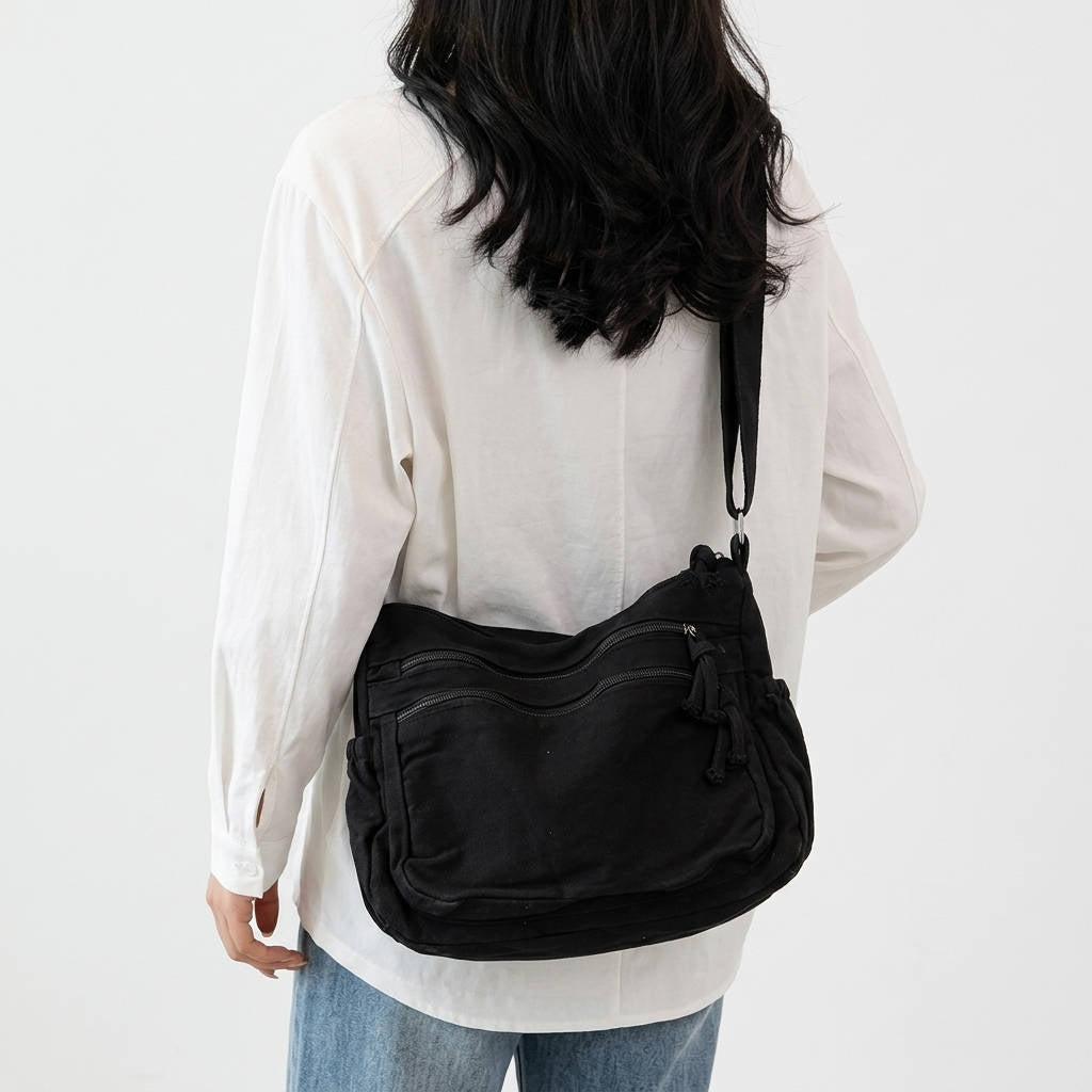 Sac bandoulière toile femmes multi-poches, style rétro élégant. Parfait pour organiser votre quotidien.