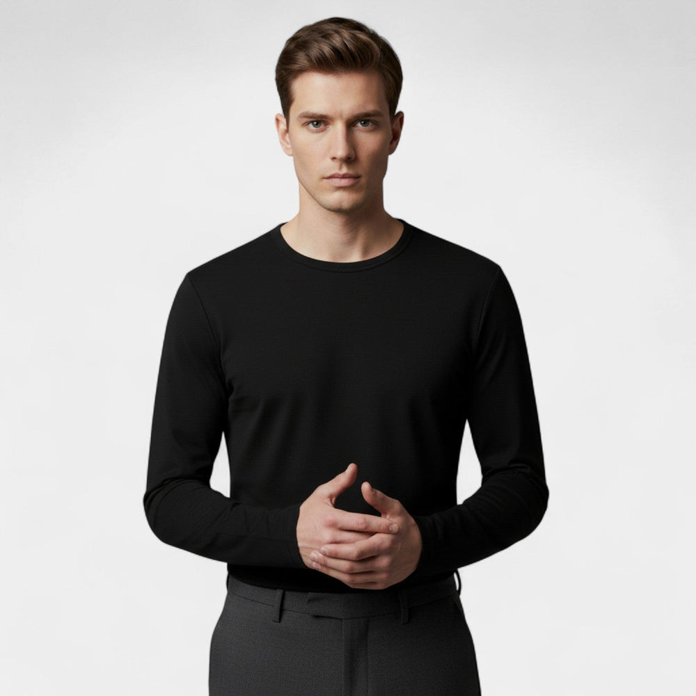Sous-t-shirt thermique homme noir, col rond, offrant chaleur et confort optimal pour l'hiver.