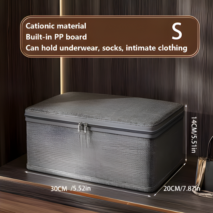 Boîte de rangement grise en tissu robuste, pliable et couvercle inclus, pour tous vos besoins.