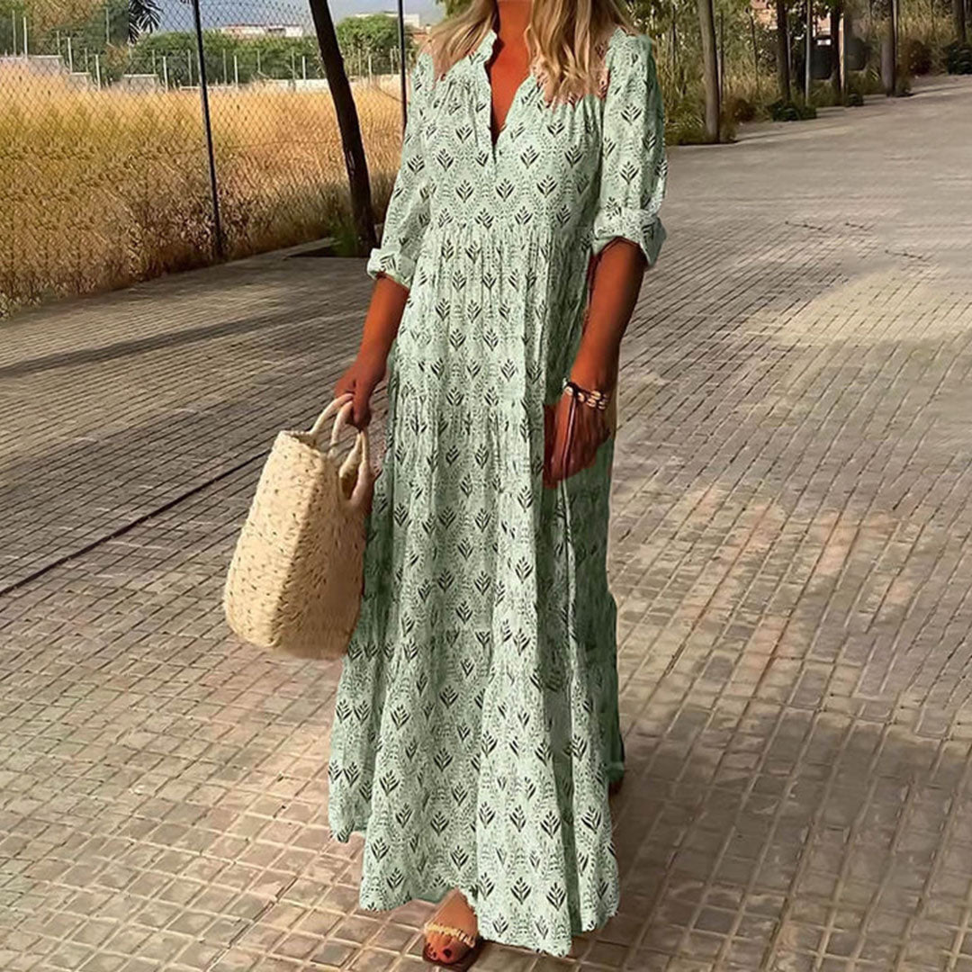 Élégante robe maxi bohème femme, col V, fluide. Parfaite pour les événements festifs du printemps et de l'été.