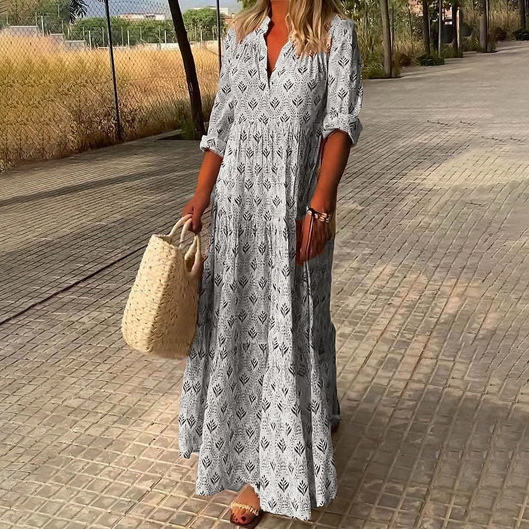 Robe longue femme, style bohème élégant, col en V fluide. Idéale pour une cérémonie de mariage ou soirée.