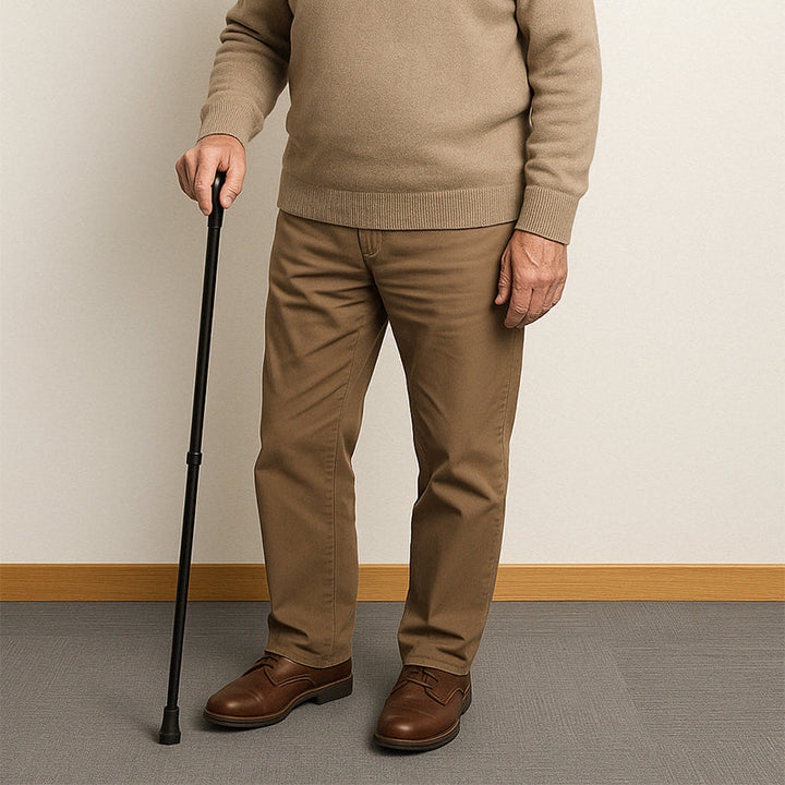 Poignée ergonomique anti-dérapante d'une canne de marche en aluminium pour confort et sécurité.