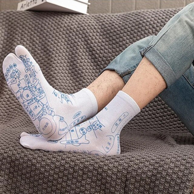 Chaussettes d'acupression FootRevive stimulant les points réflexes pour le soulagement et le confort des pieds.