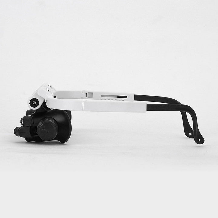 Lunettes loupe optique haute précision avec éclairage LED intégré pour travaux fins et détaillés.