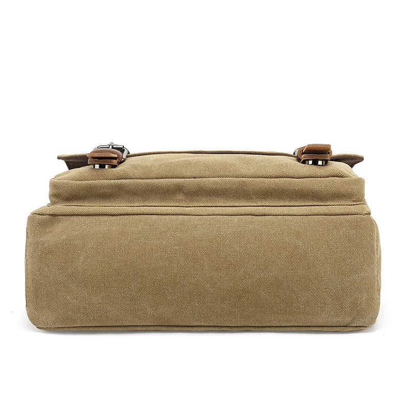 Sac à bandoulière bleu en toile, sacoche robuste et pratique pour étudiant, voyage ou travail.
