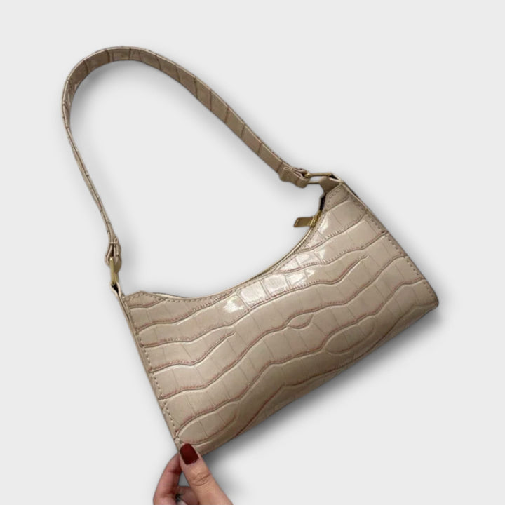 Sac à main femme noir en cuir brillant, élégant et raffiné, un classique indémodable.