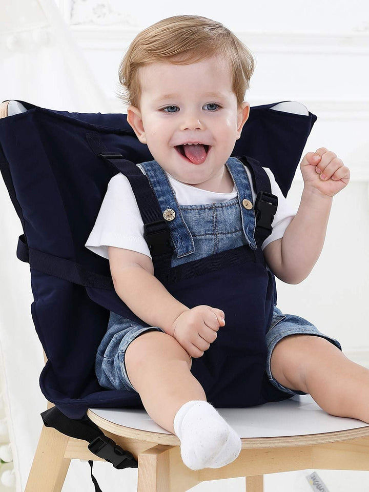 Chaise haute bébé portable en coton avec harnais de sécurité pour les repas.